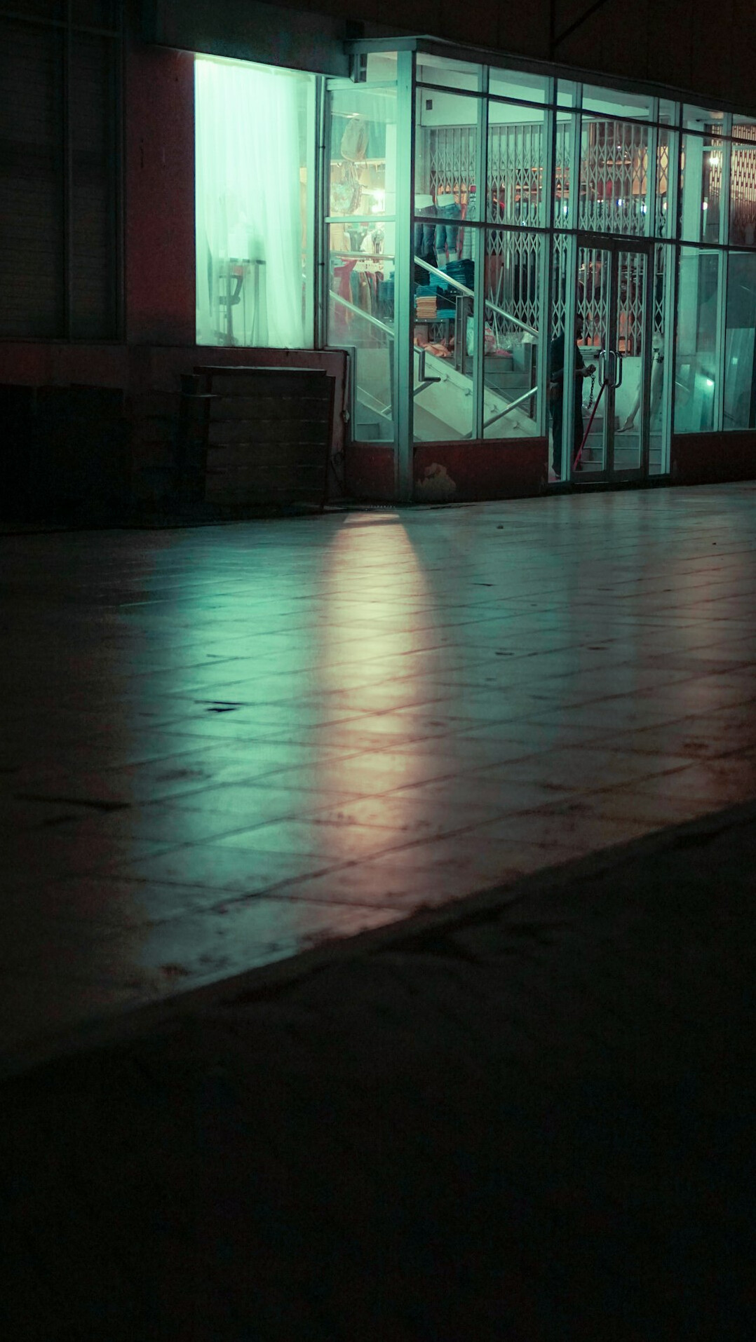 empty store aisle at night