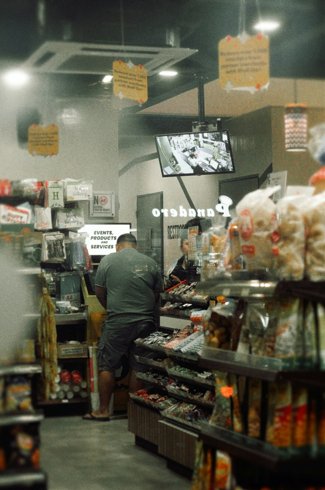 store security guard watching cameras