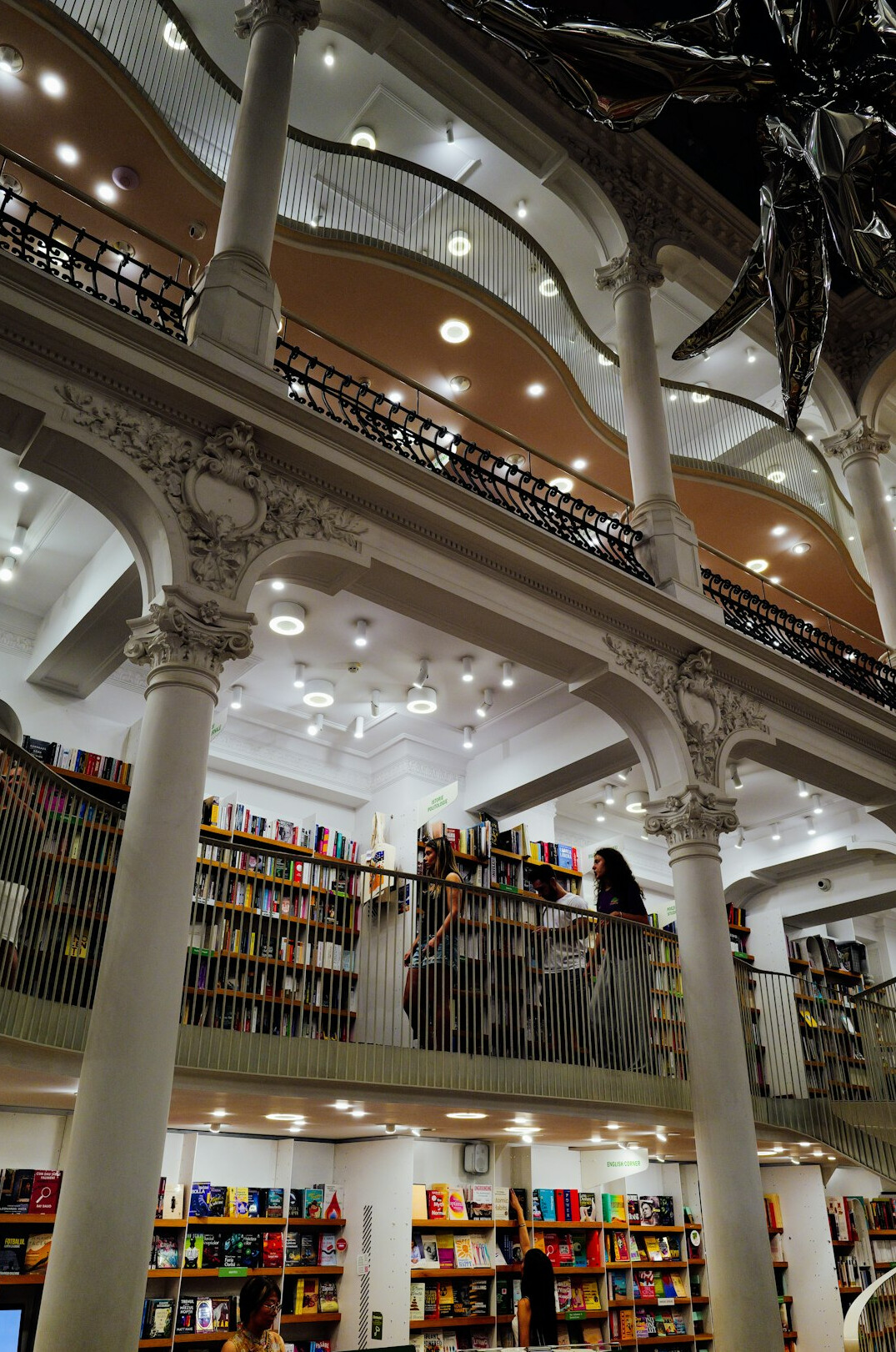 Grand library interior with tall bookshelves