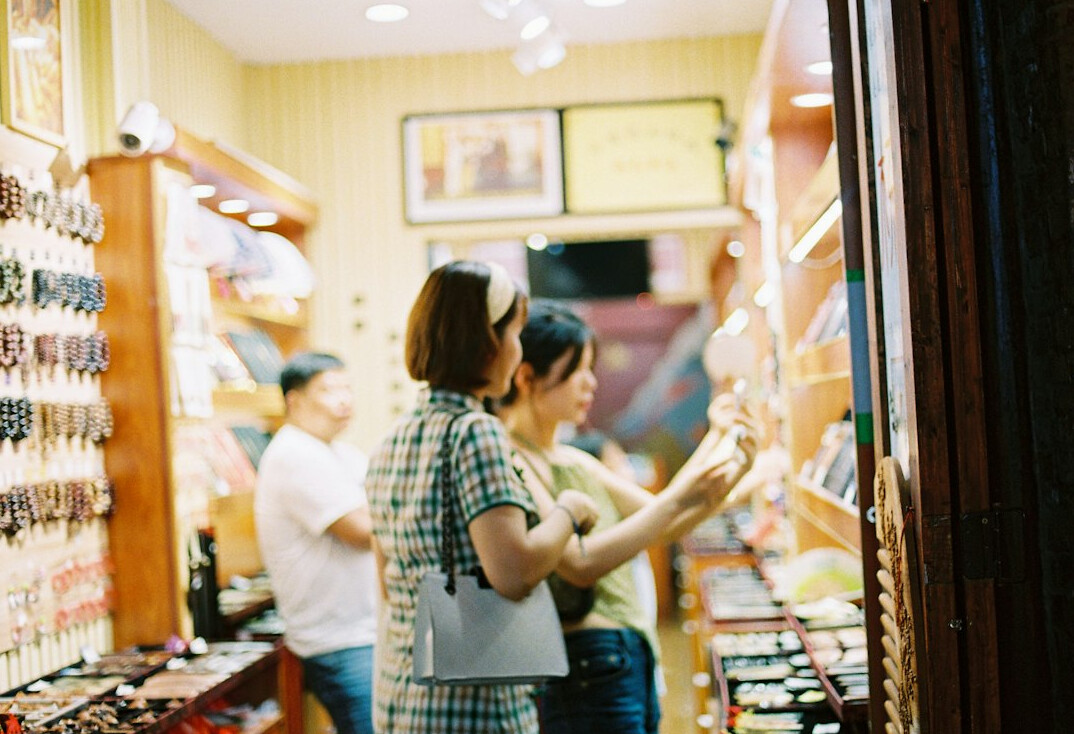 store detective observing shoppers